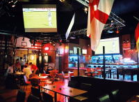 Watch, play, eat. a three-pronged sports bar